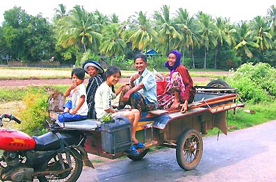Cambodia Travel Riding the ladder wagon Kampong Cham copyright Don Pirot.jpg